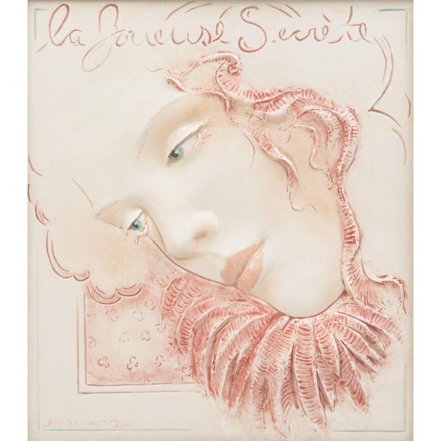 A figurative ceramic tile titled "La Jousese Secret" by Frank Gallo. Circa 1980s. Signed on the lower left with an...