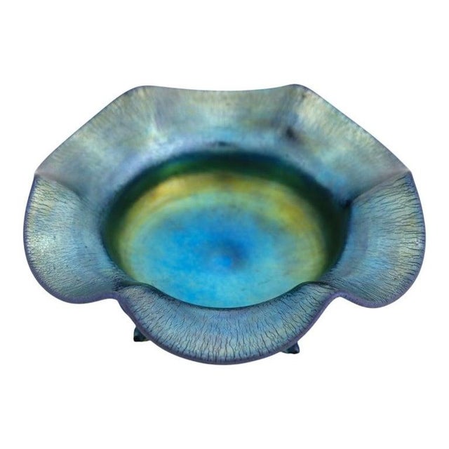 This Steuben Blue Aurene footed candy dish, dating to approximately 1920, exemplifies the sophisticated artistry of early...
