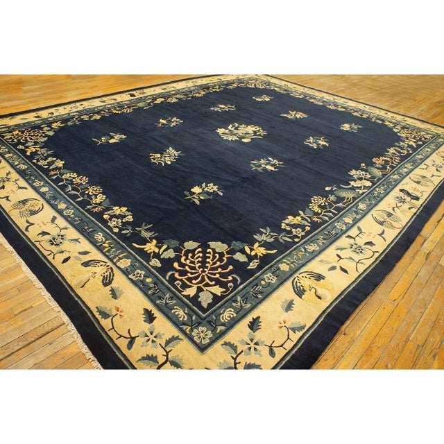 Antique Chinese Allover Floral Blue 1920s Rug, Circa Date: 1920s. This exceptional Chinese Art Deco piece captures the...