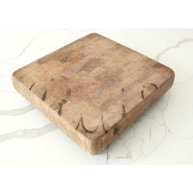 Mid-century butcher block/chopping board with bun feet, being sold as found. We love to rescue these timeless old...