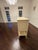 Antique ivory side board with ample storage. Good condition, very lightly used. Pewter hardware and antique mirror doors....