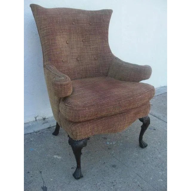 Styling and profiling! This comfy, vintage, English-style wingback armchair has a unique silhouette with pinched corners...