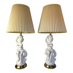 Mid 20th Century Hollywood Regency White Porcelain Cherub Lamps - A Pair
