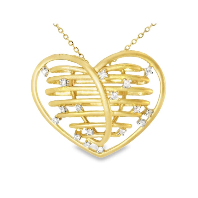 This beautiful estate 14K yellow gold heart pendant is a stunning piece that combines timeless design with sparkling...