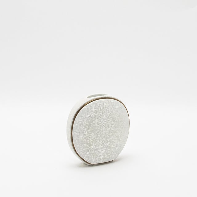 This exquisite vase by R&Y Augousti captures the essence of artisanal craftsmanship with its luxurious shagreen surface,...