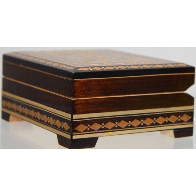 The intricate design on our box will grab your attention. Great details have been formed out of different shades of wood...