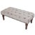 Meticulously handcrafted in the United Kingdom, this upholstered stool boasts classic studding and hand-polished solid...