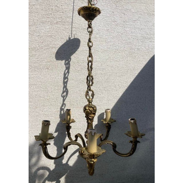 Louis XV style brass chandeliers 5 lights, dimensions: height 75, width and depth 45. European Plug (up to 250V).The...