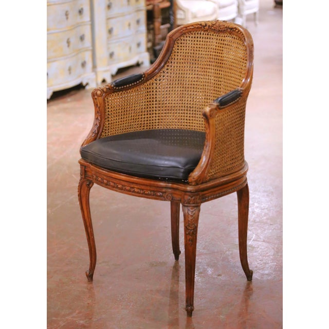This elegant antique French armchair was crafted in France circa 1880 and exemplifies the graceful lines and refined...