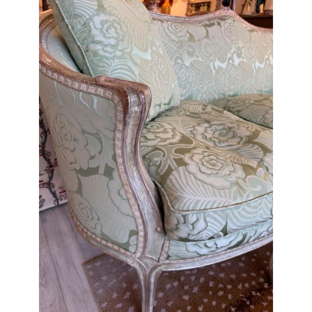 This is a stunner for sure. This vintage piece has the most beautiful finish and the upholstery is mint. All down with 3...