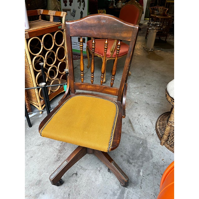 1920s Antique Bankers Chair With Nail Head Trim and Wheels For Sale - Image 5 of 5