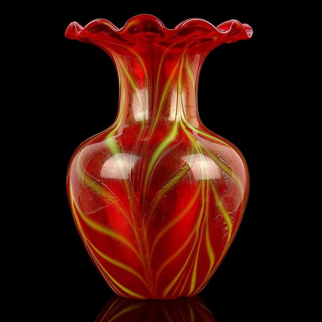 Beautiful vintage Murano hand blown red, yellow and gold flecks Italian art glass flower vase. Created in the style of...