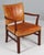 Polexim armchair in style of Kaare Klint. Frame of mahogany. Upholstered with patinated nature leather. with brass nails....
