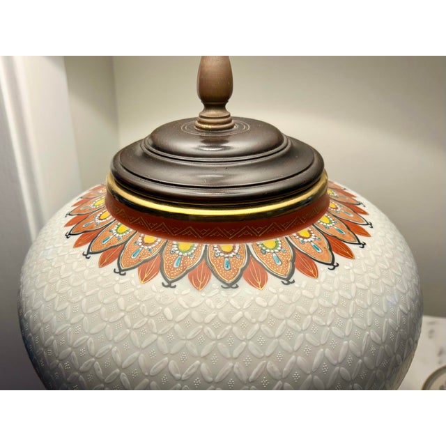 Vintage, large hand painted ginger jar lamp. Gorgeous detail at the top and bottom of this lamp. Unique white textured...