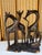 This beautiful and exceptionally solid East African sculpture features an intertwined herd of five giraffes meticulously...