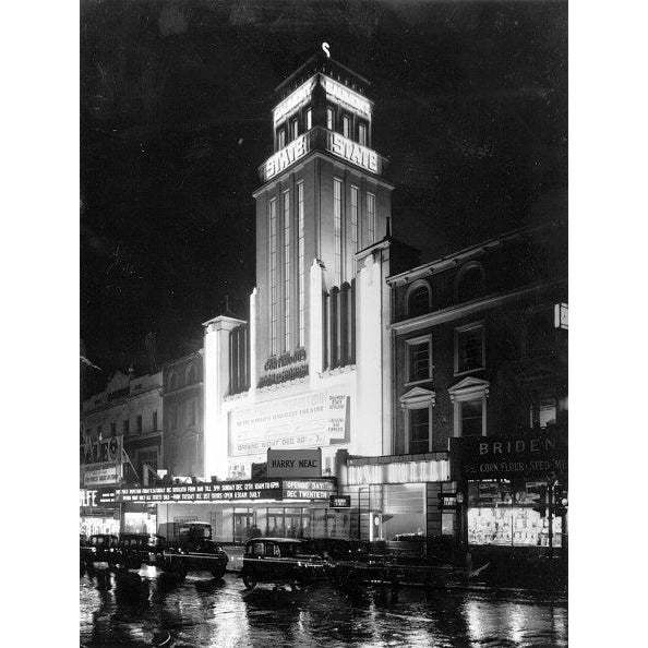 Gaumont State 22nd December 1937: The billing for the opening of the Gaumont State cinema in Kilburn, reads 'The World's...
