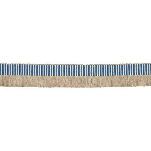 Graphic Fringe is a wide, ribbed ottoman tape with dense fringe along one side. Stylish and substantial, it’s an...