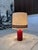 This large high quality ceramic table lamp was manufactured in West-Germany during the 1960s. It features a heavy vase-...
