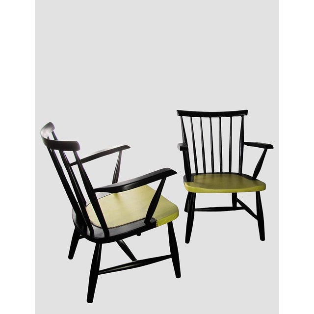 - Set of 2 spindle back armchairs, 1950s-1960s - In the style of Ilmari Tapiovaara and Yngve Ekstrom - The chairs are made...