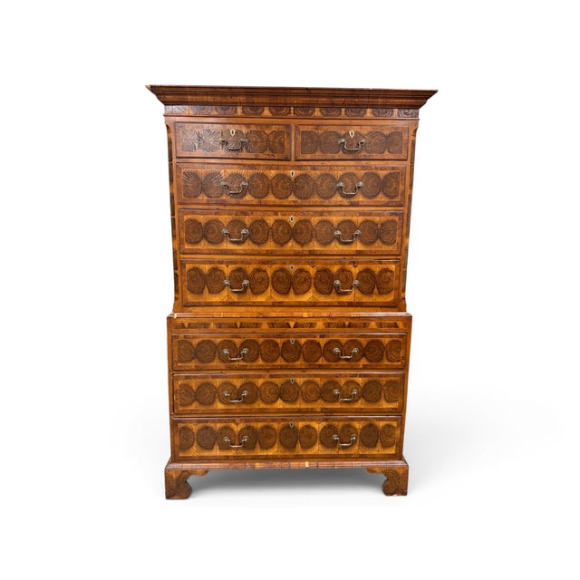 A rare 17th Century William And Mary English 8-Drawer Chest-on-chest with circular book-matched grain oyster walnut veneer...