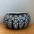 This striking studio pottery vessel makes a bold statement with its substantial scale and primitive, tribal-inspired...
