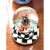 This is a vintage Mackenzie-Childs Christmas Holiday Snow Globe, it depicts a teddy bear with presents and sits upon a...