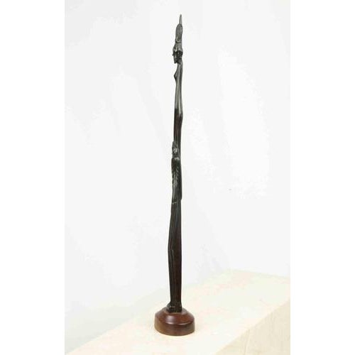 Balinese bronze sculpture of woman. Placed on a wooden pedestal. Excellent condition.