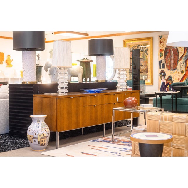 A vintage Florence Knoll executive office credenza. This is a beautifully refinished mid century cabinet. It is in...