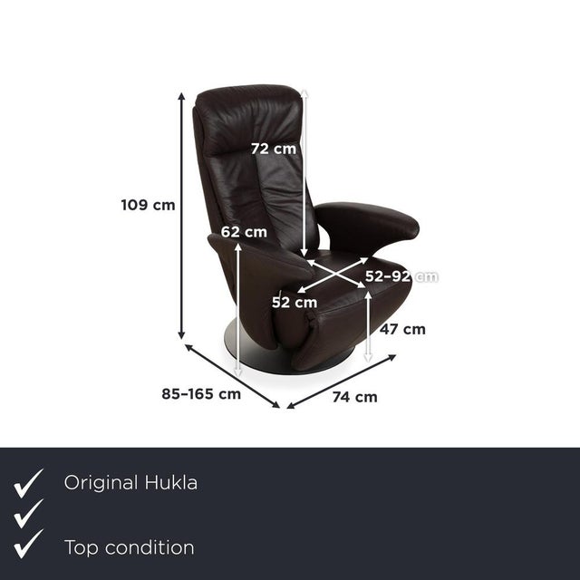 The Hukla leather armchair embodies classic comfort, high-quality craftsmanship, and relaxed elegance. with its inviting...