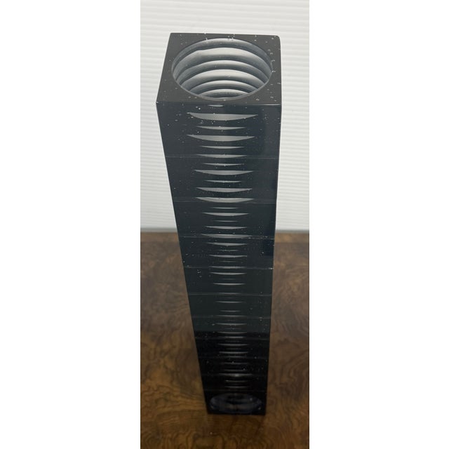 Design Plus Gallery presents Downtown, a Towering Vase from 2004. The vase is quite captivating and made from crystal....