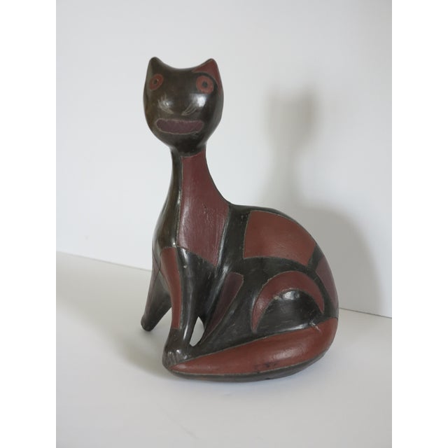 A quite wonderful and rare 1950s pottery cat with abstract geometric coloring by Mexican artist Manuel Felguerez Barra....
