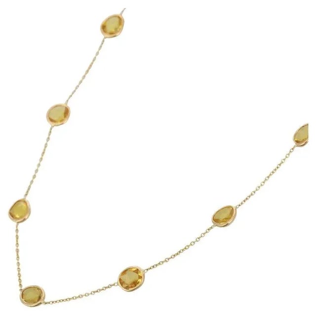 This is part of Chairish’s Fine Jewelry assortment. Yellow Sapphire Necklace in 18K Gold studded with mix cut sapphire...