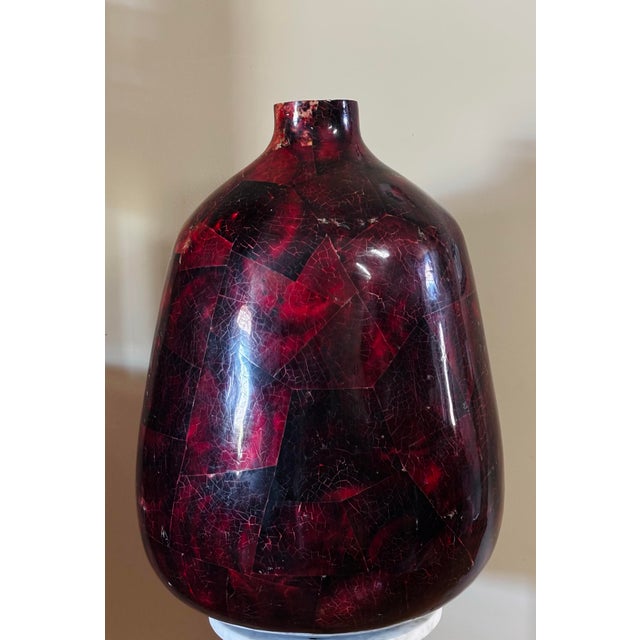 Oversized fiberglass vessel, measures 27” high, with a 51” circumference middle. Crackled, patchwork design of crackled...