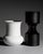 Curated porcelain vase duo designed by Tapio Wirkkala for Rosenthal Studio-Line, combining two contrasting forms in black...