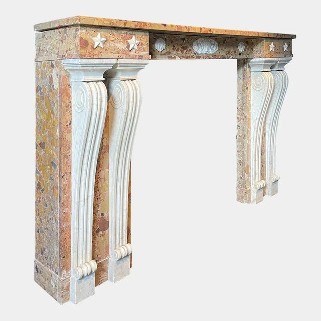 An unusual and imposing French Louis XVI style fireplace Breche d'Alep marble and Statuary white marbles. The carved...