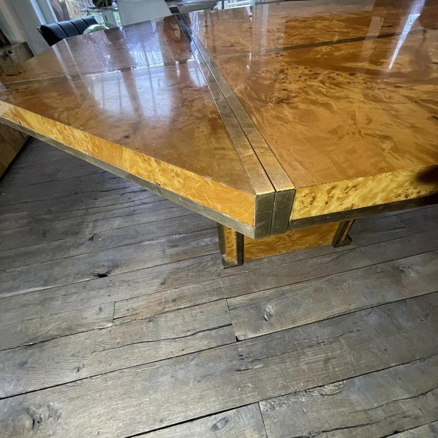 Hollywood regency style dining table “glamor seventies”. Dining table for up to 12 people, in burr/walnut burl with gilt...