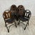 Antique wood folding chairs that came out of a Masonic temple made in the USA