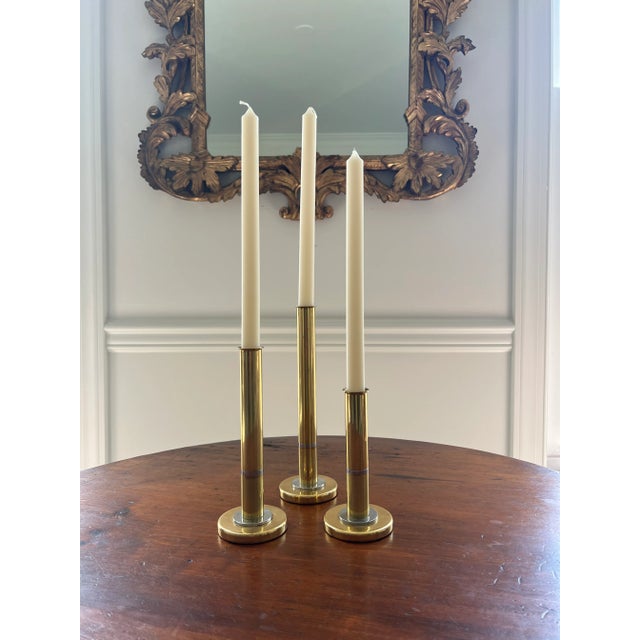 This rare set of Danish vintage mixed metal mid-century candlestick holders in the manner of Karl Springer are stunning....