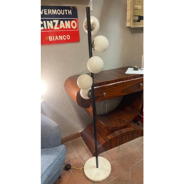 Earth lamp with white opal spares and iron and brass structure base in white marble European Plug (up to 250V).The wiring...