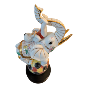 Vintage Ceramic Boy Playing Flute – Hand-Painted Figurine – Riding a White Elephant - Musical Serenity & Childhood Joy