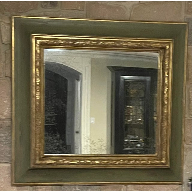 AVAILABLE IMMEDIATELY A striking Paul Ferrante Alana mirror featuring a hand-finished 22-karat gold leaf frame with an...