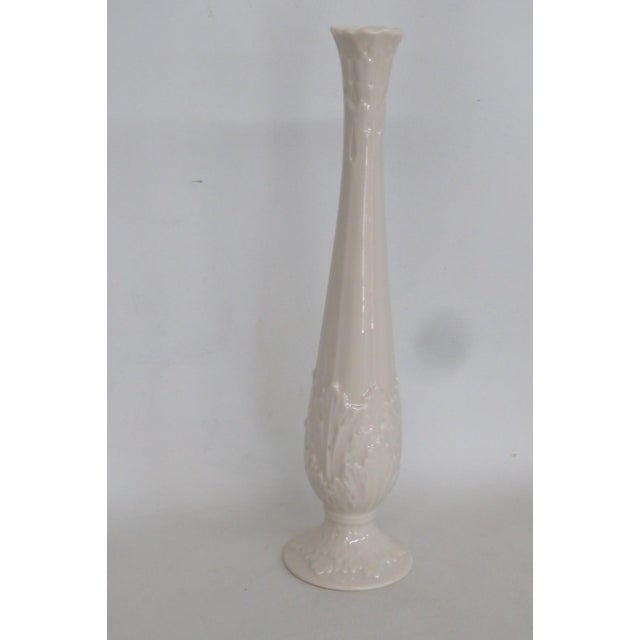 This gorgeous Embossed Bud Vase is made of porcelain. This lovely slender vase is stamped on the bottom as being made by...