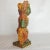 This fun wooden statue is the burst of color every room needs! Perfect for all your eclectic desires. The paint has been...