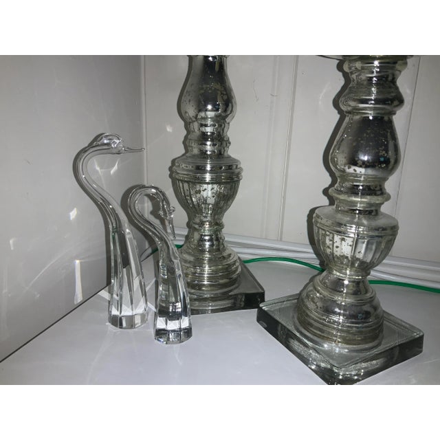 Elegant Shannon crystal swans. A wonderful set of two. They sparkle beautifully. Small measures 1.5x1.5x6 Large measures...