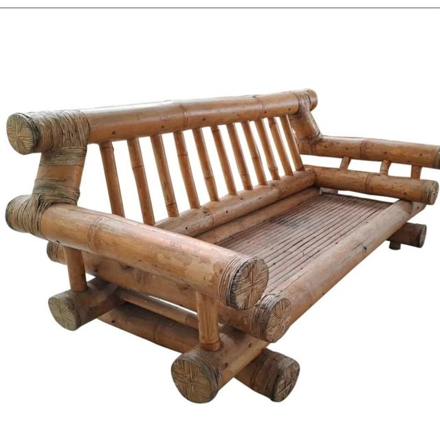 Original vintage bamboo living room set, produced in Italy during the 1970s, featuring a strong sculptural design and a...