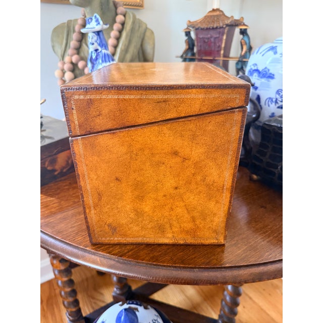 Vintage Maitland Smith box Trompe L'oeil Styling: The front mimics rare multi-colored leather book spines including works...