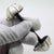 This vintage spoon rest combines solid 925 sterling silver with fine glass in a stylized peacock motif. Crafted in italy...