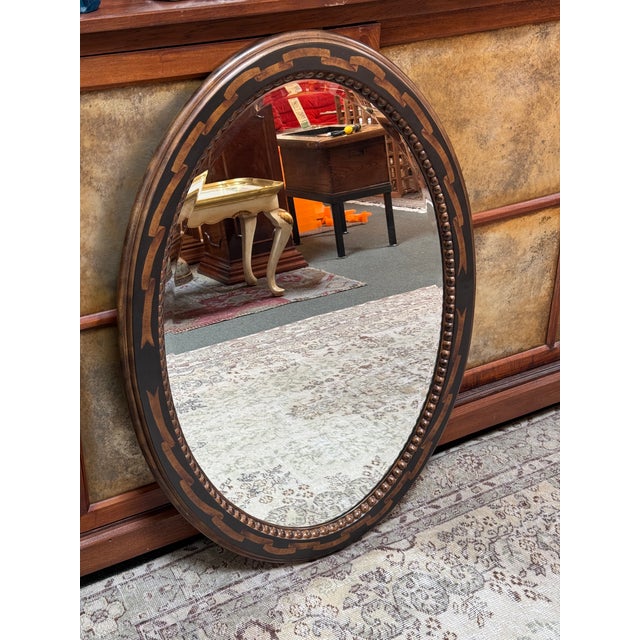 Design Plus Gallery presents an Inlaid Burl Wood Wall Mirror with Neoclassical Style. The beveled edge mirror is inset an...
