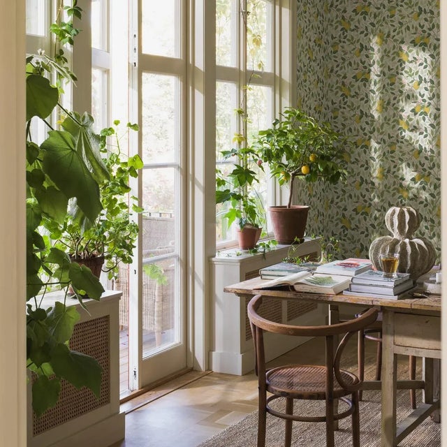 Derived from a hand-painted pattern of lush flowering lemon trees and delicately rendered butterflies, Boråstapeter’s...