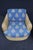 Pair of custom wicker swivel lounge chairs attributed to Century Furniture, dating to the 1980s. Each chair features a...